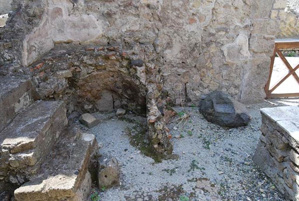 VII.4, Herculaneum, June 2008. Looking east towards north-east corner. Photo courtesy of Nicolas Monteix.
According to Monteix – “Maiuri mentions two large cylindrical furnace/hearths for large boilers which have disappeared. This description as well as the mention of a laundry in the “Vecchi Scavi” could imply the existence of a fleece/wool laundry in this space.”
See Monteix, N. 2010. Les lieux de metier. Boutiques et ateliers d’Herculanum. (p.407-8).